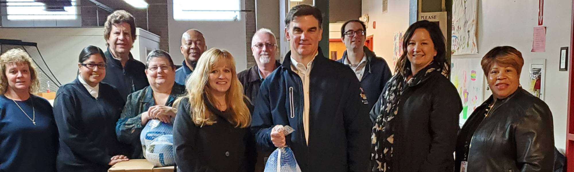 group of astound employees at a food bank